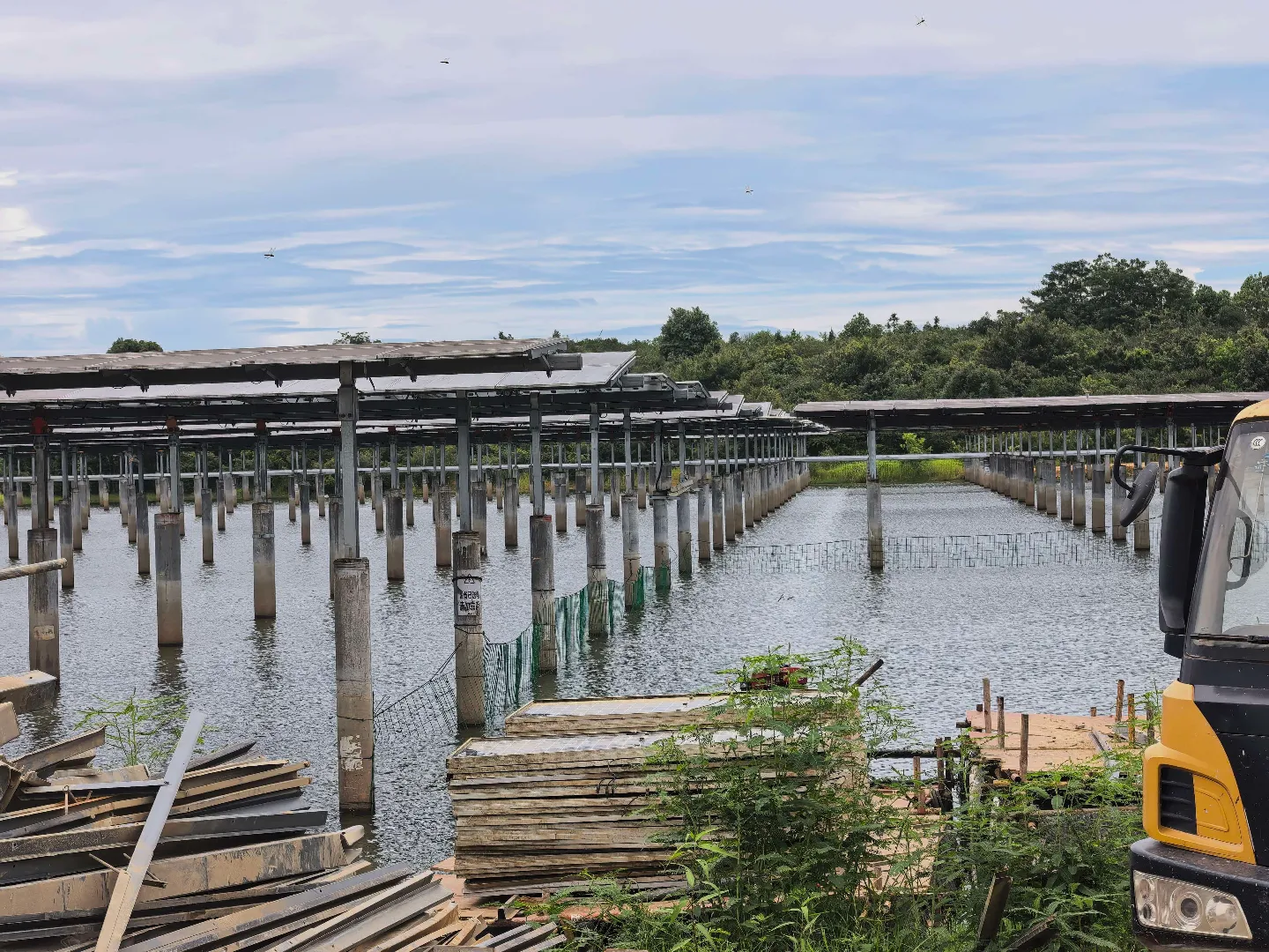 Solar tracker project rows installed over a water site